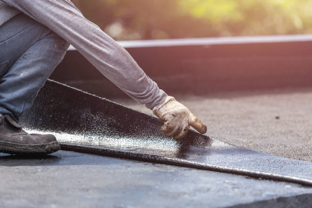 Professional Basement Waterproofing technician working in Garden City, AL
